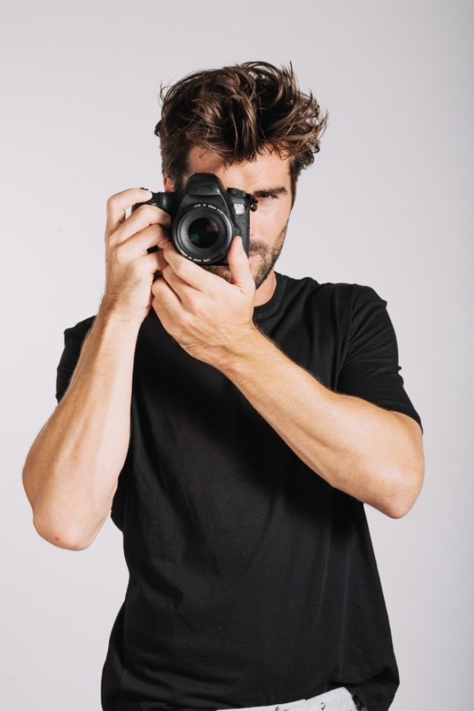 holding the camera in the other format