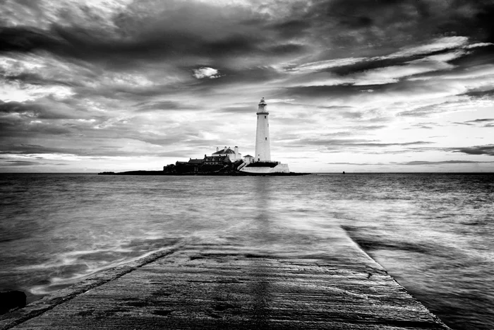 black and white landscape photogaphy pier lighthouse