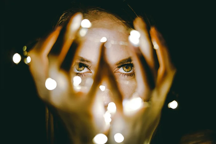 fairy light portrait photography closeup of girls eyes
