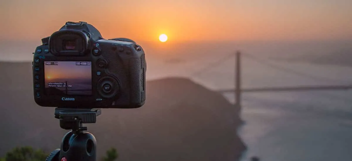 camera in sunset at golden gate bridge