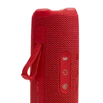 اسپیکر JBL Flip 7 قرمز با بند و دکمه‌ها در حالت ایستاده