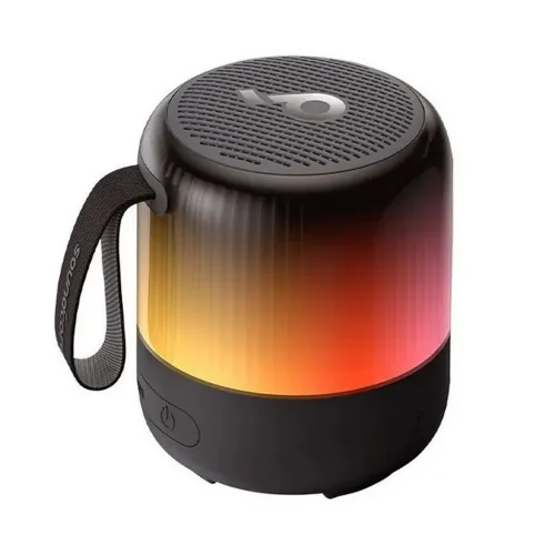 اسپیکر Soundcore Glow Mini با نور زرد و نارنجی از زاویه بالا